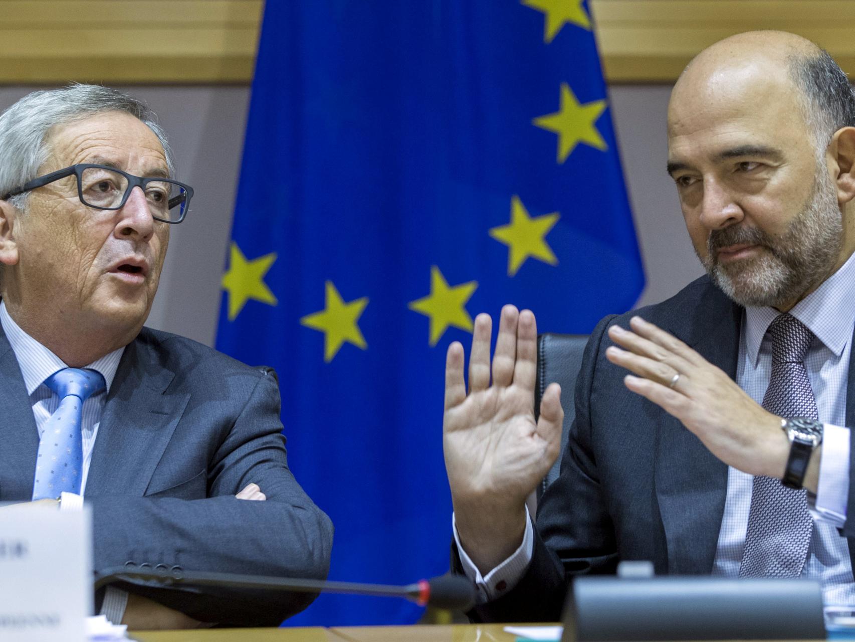 Jean-Claude Juncker y Pierre Moscovici.