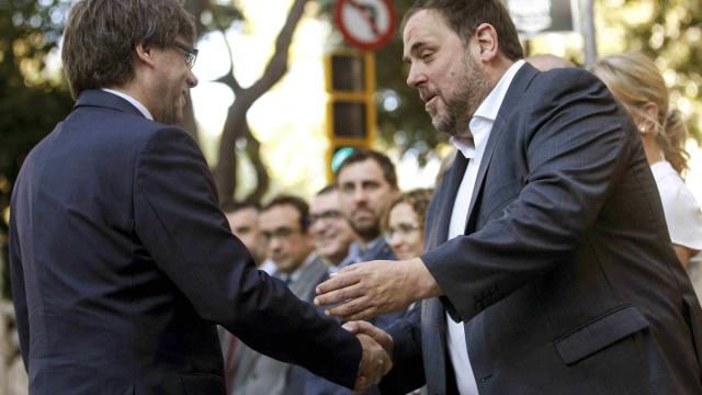 Carles Puigdemont y Oriol Junqueras.