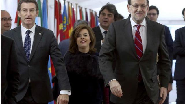 Alberto Núñez Feijóo con Mariano Rajoy y Soraya Sáenz de Santamaría.