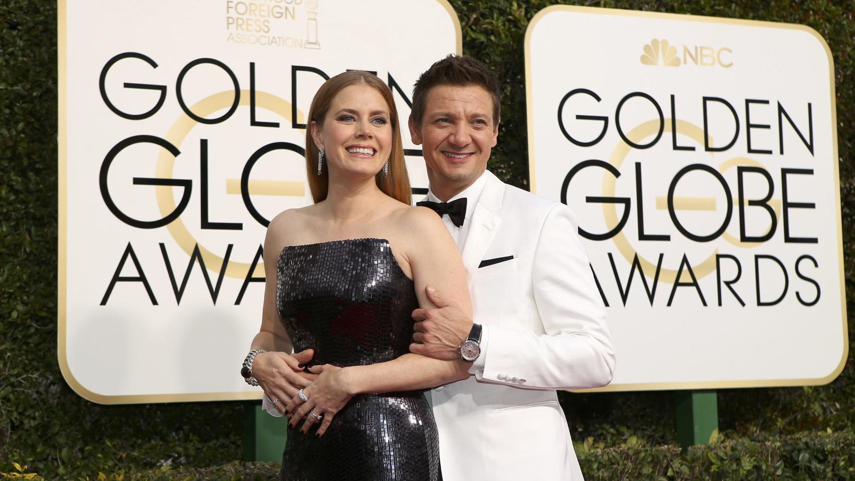 Los actores Amy Adams y Jeremy Renner, a su llegada al hotel Beverly Hilton de Los Ángeles.