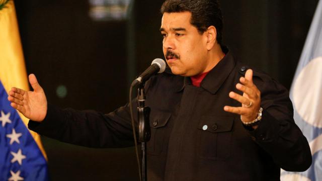 Venezuela's President Nicolas Maduro talks to the media during a news conference at Miraflores Palace in Caracas