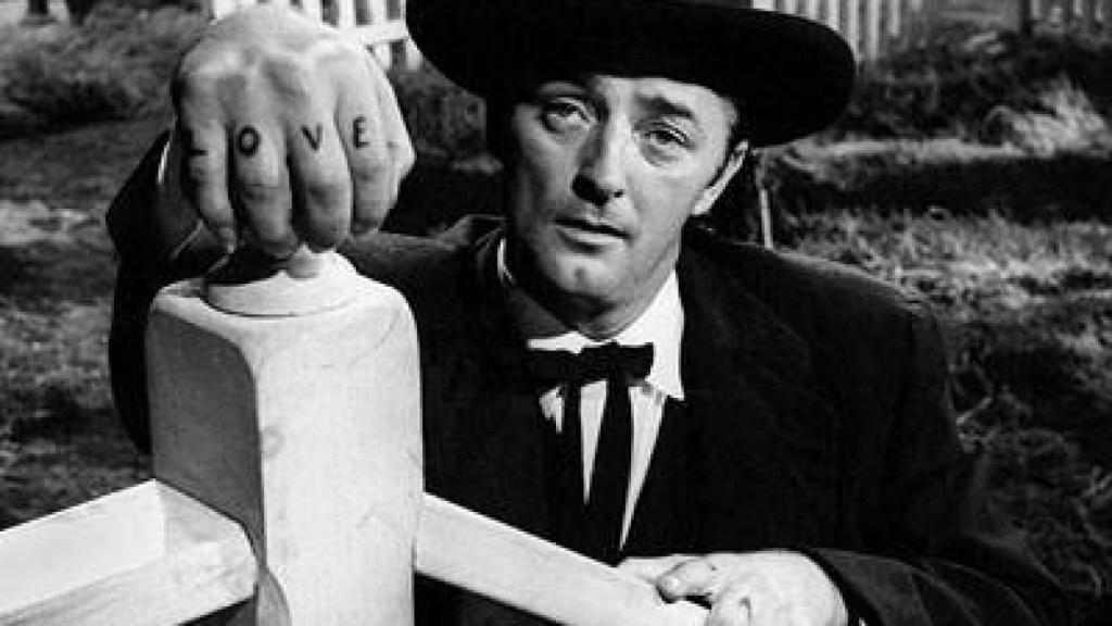 Robert Mitchum en la película La noche del cazador.