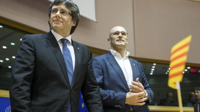 Puigdemont y Romeva, durante su visita a la Eurocámara en enero