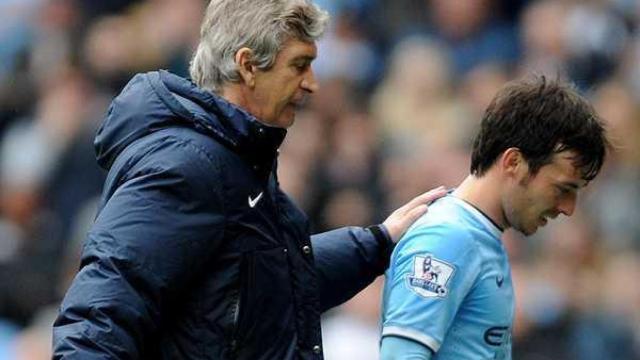 David Silva y Manuel Pellegrini en una imagen de archivo.