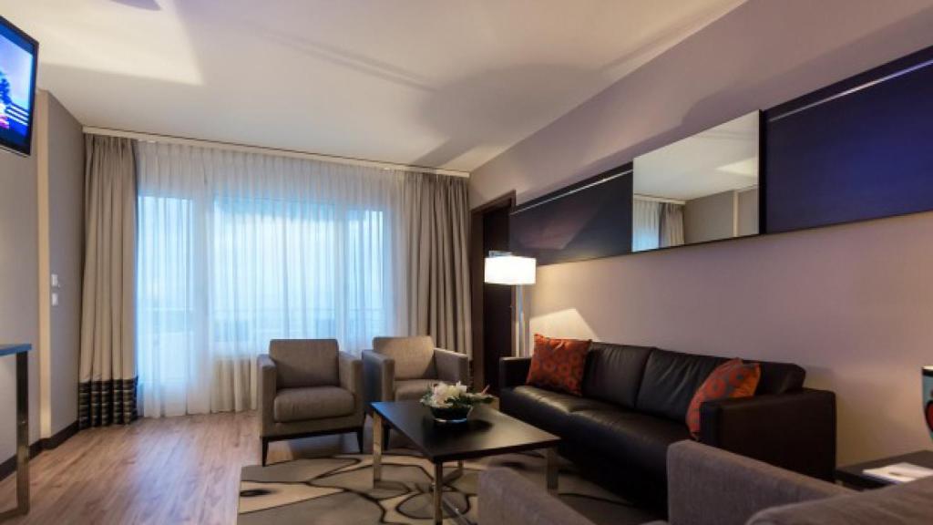 Sala de estar de la clínica de Genolier.