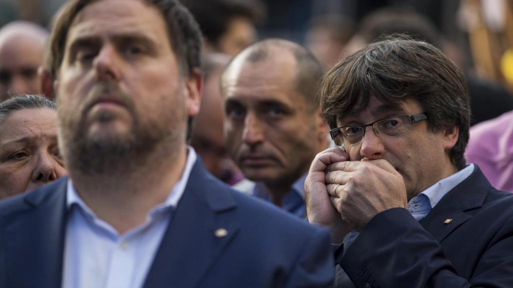 Junqueras y Puigdemont durante la manifestación en apoyo a los Jordis en Barcelona.