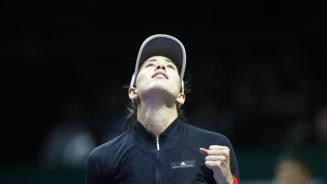Muguruza, celebrando su victoria ante Ostapenko.
