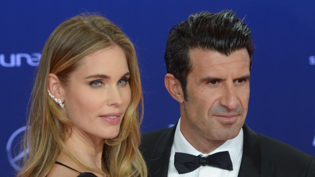 Luis Figo y Helen Svedin posando en el photocall.