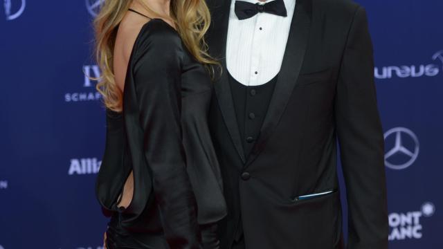 Luis Figo y Helen Svedin posando en el photocall.