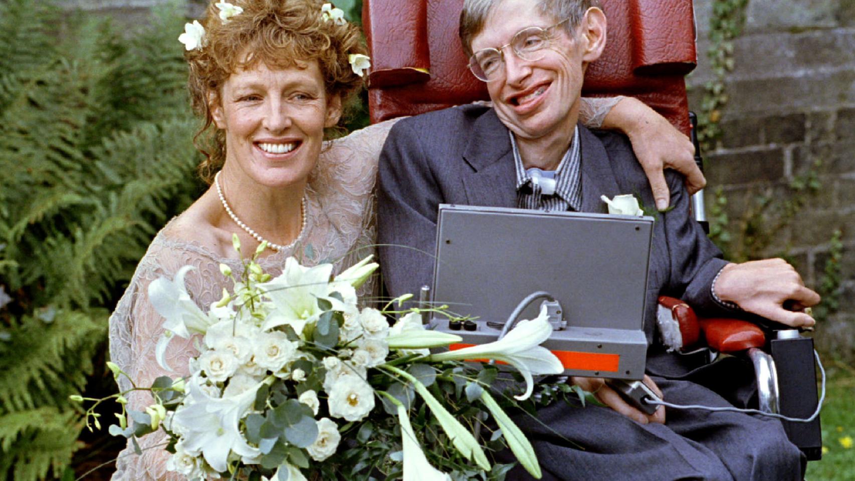 FILE PHOTO: Stephen Hawking and his new bride Elaine Mason pose for pictures after the blessing of their wedding at St. Barnabus Church