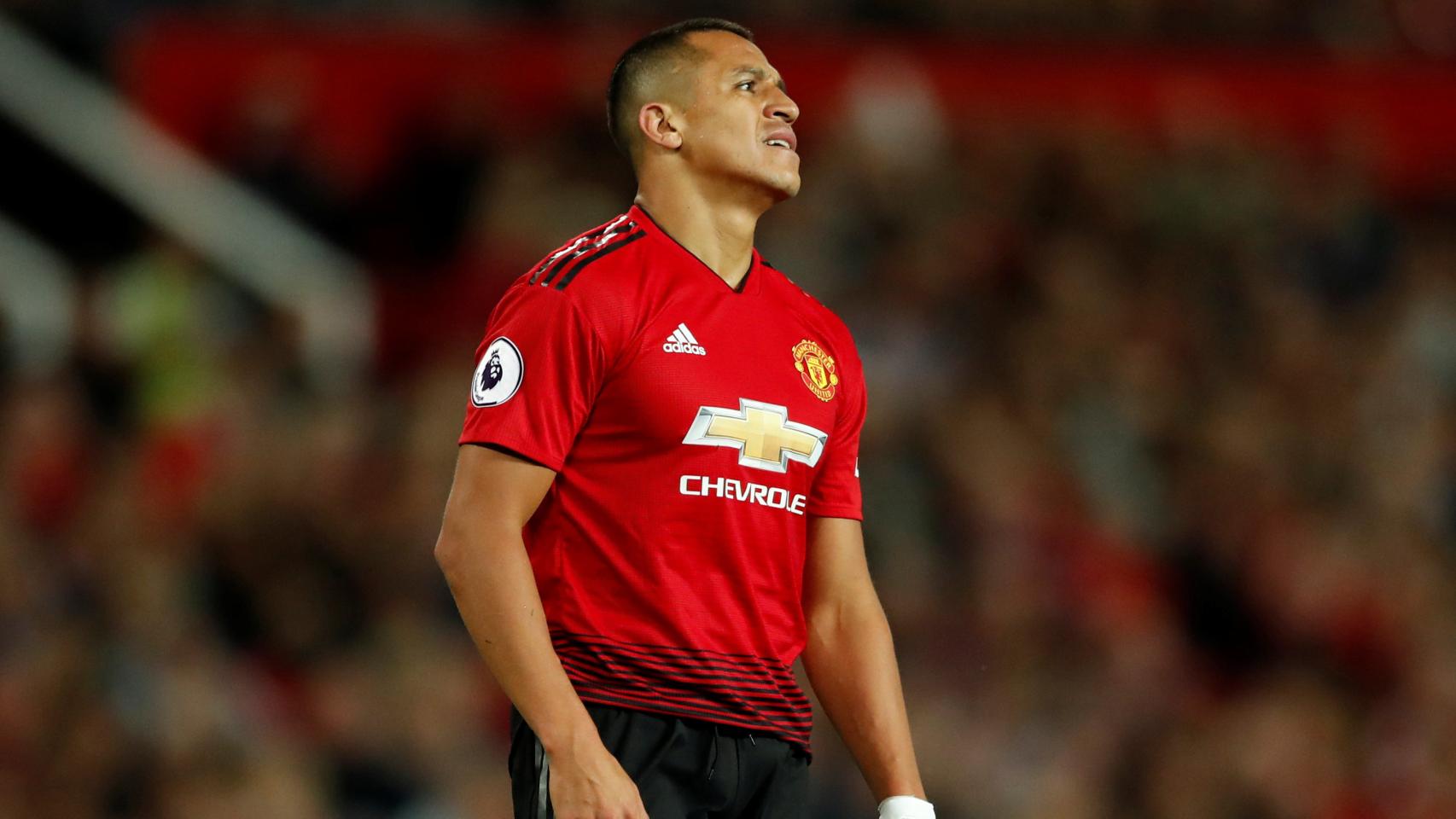 Alexis se lamenta durante un partido del United