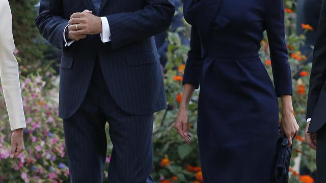 Los reyes a su llegada al Grand Palais.