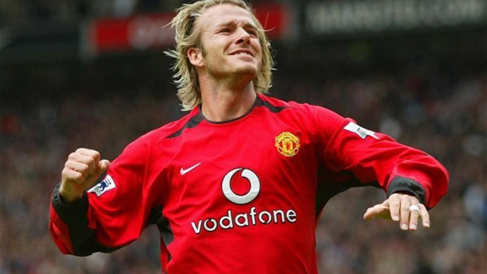 Beckham celebra un gol con la camiseta del United
