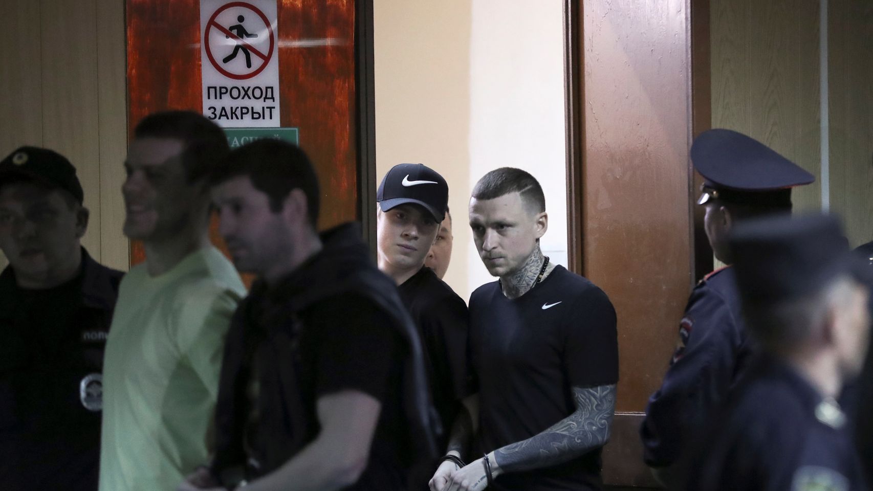 Russian soccer players Mamayev and Kokorin attend a court hearing in Moscow