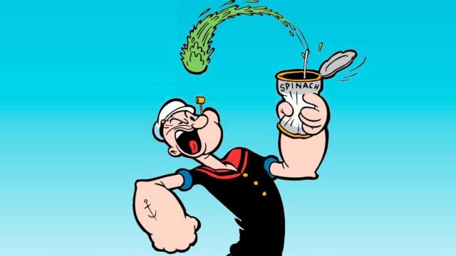Popeye tomándose uno de sus botes de espinacas.