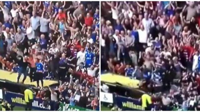 Los aficionados del Glasgow celebran un gol de su equipo