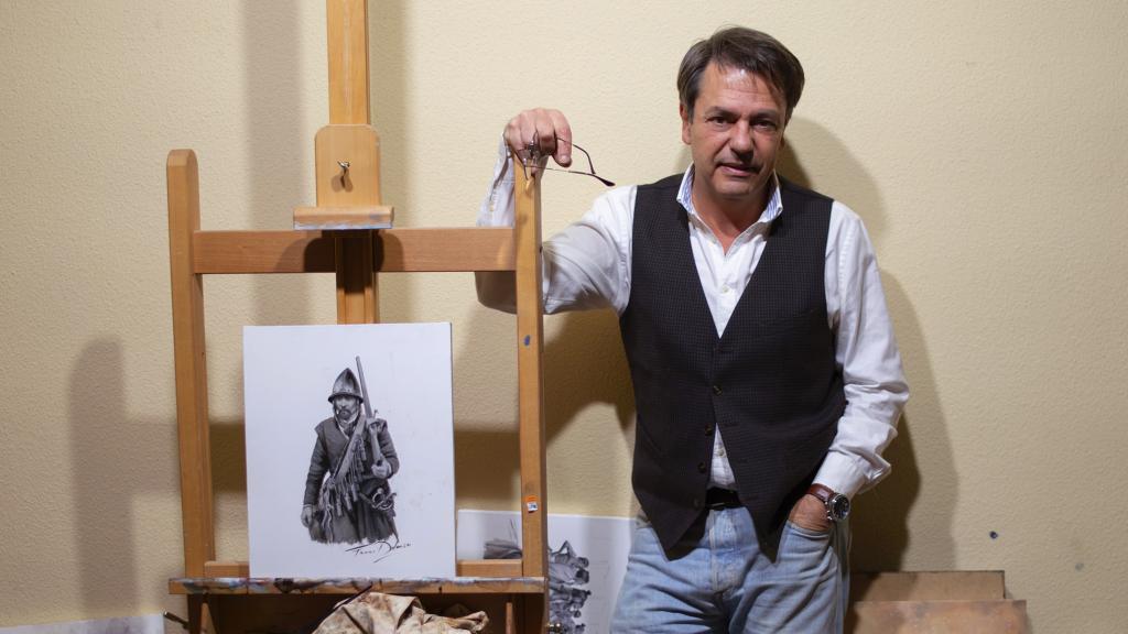 El pintor Augusto Ferrer-Dalmau en su taller