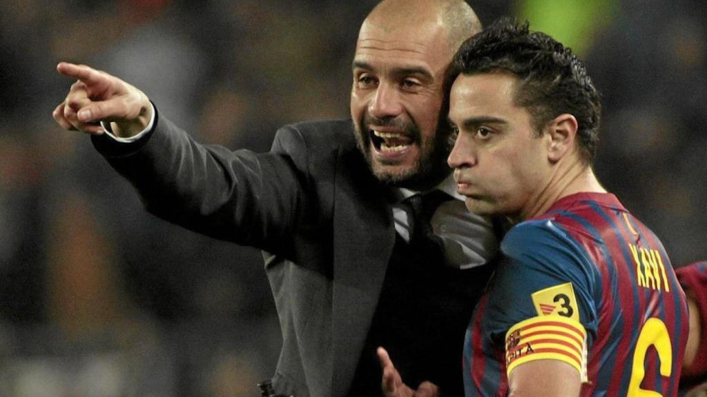 Pep Guardiola y Xavi, en el Barcelona