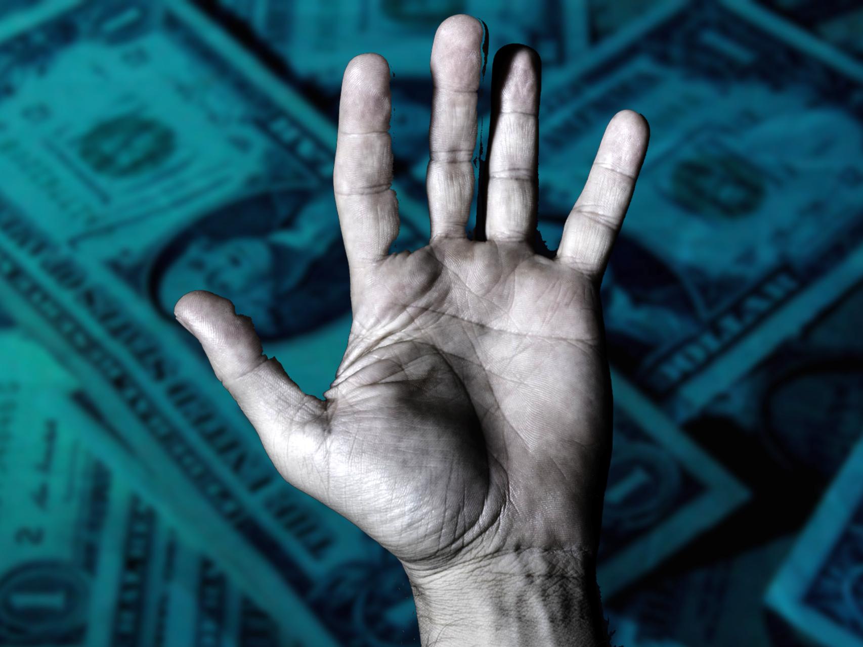 Montaje de mano y dinero