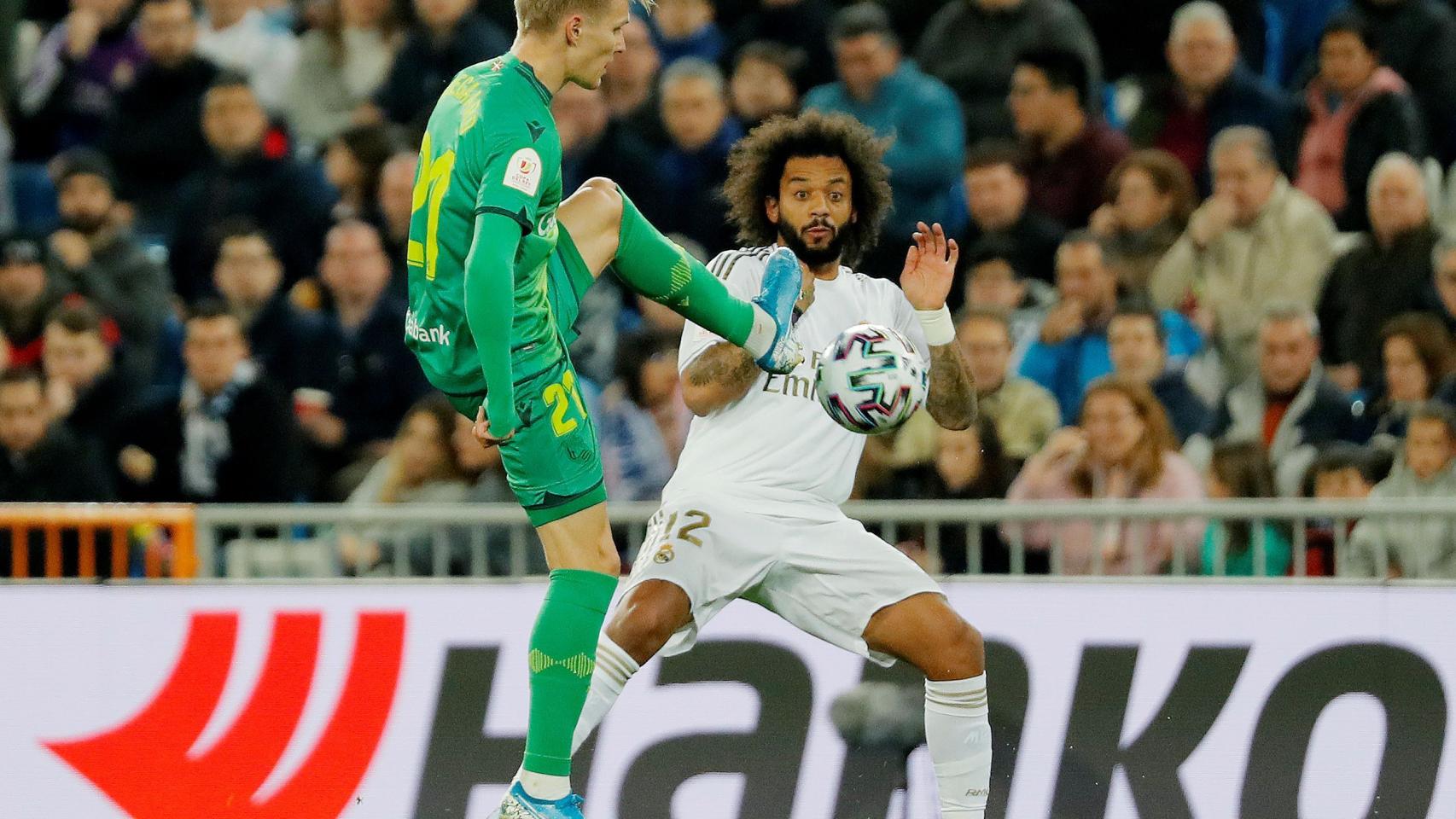 Odegaard corta un balón ante Marcelo