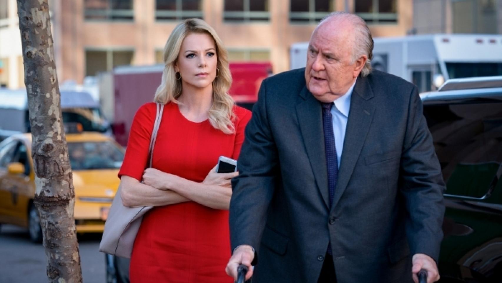 Charlize Theron y John Lightgow