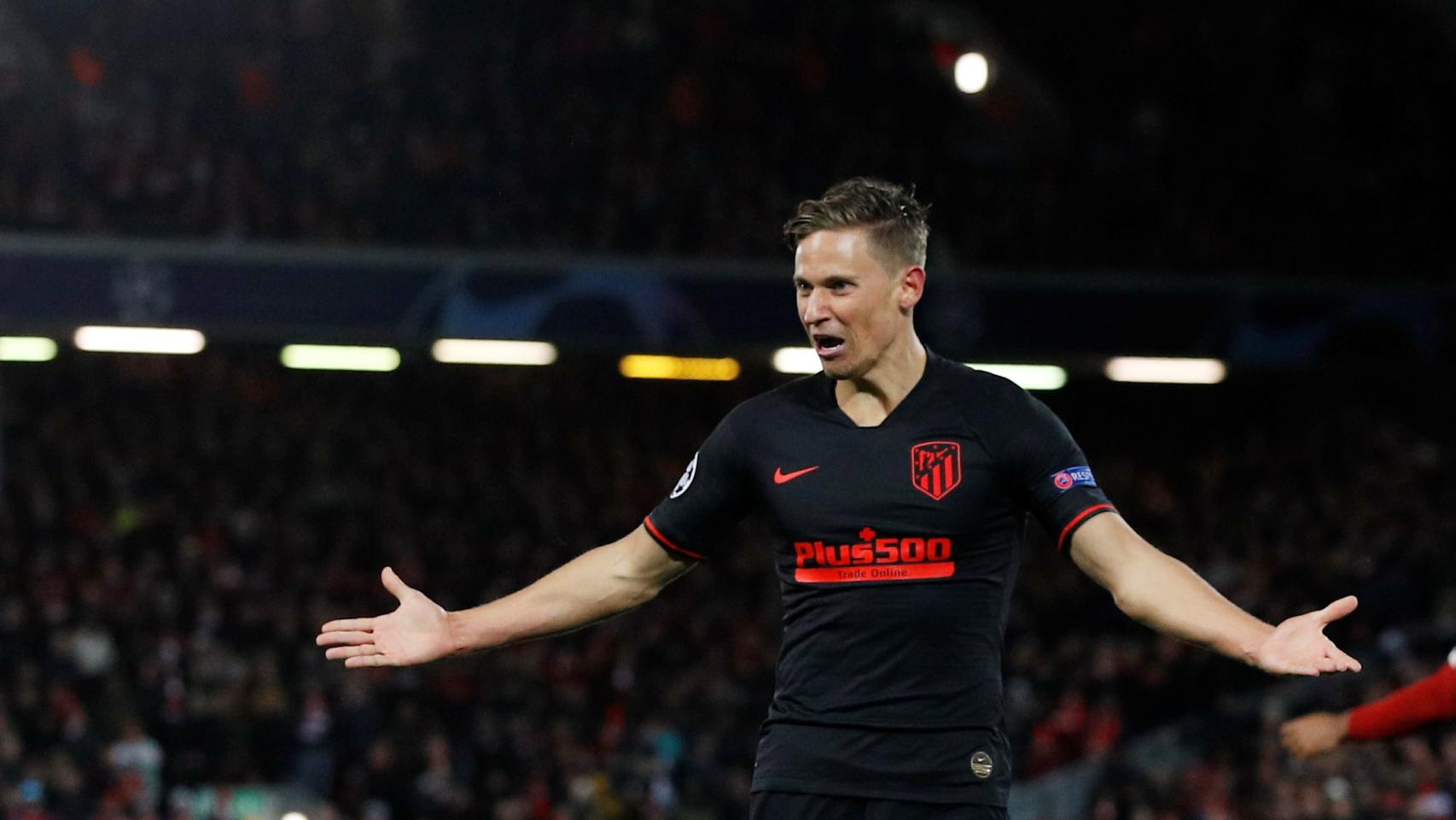 Marcos Llorente celebra uno de sus goles al Liverpool