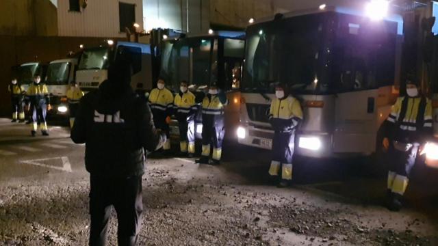 Trabajadores del STL con medidas sanitarias de protección contra el virus.
