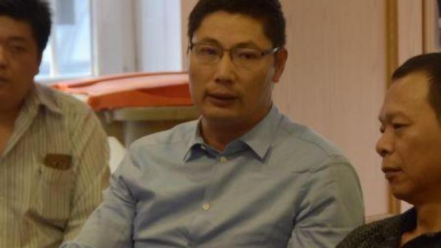 Chen Shangli en una reunión.