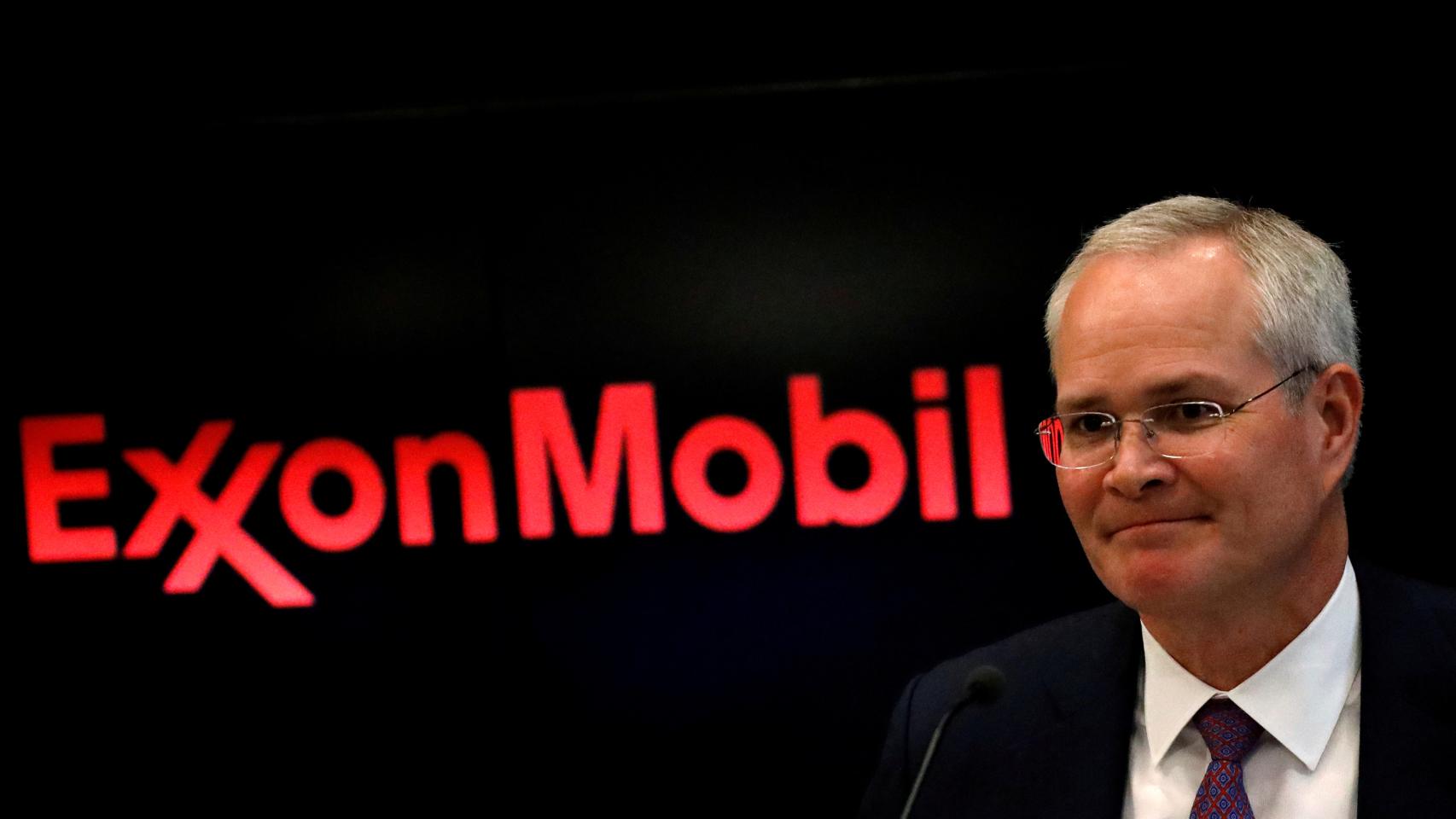 FILE PHOTO: Darren Woods, Chairman & CEO, Exxon Mobil Corporation attends a news conference at the NYSE