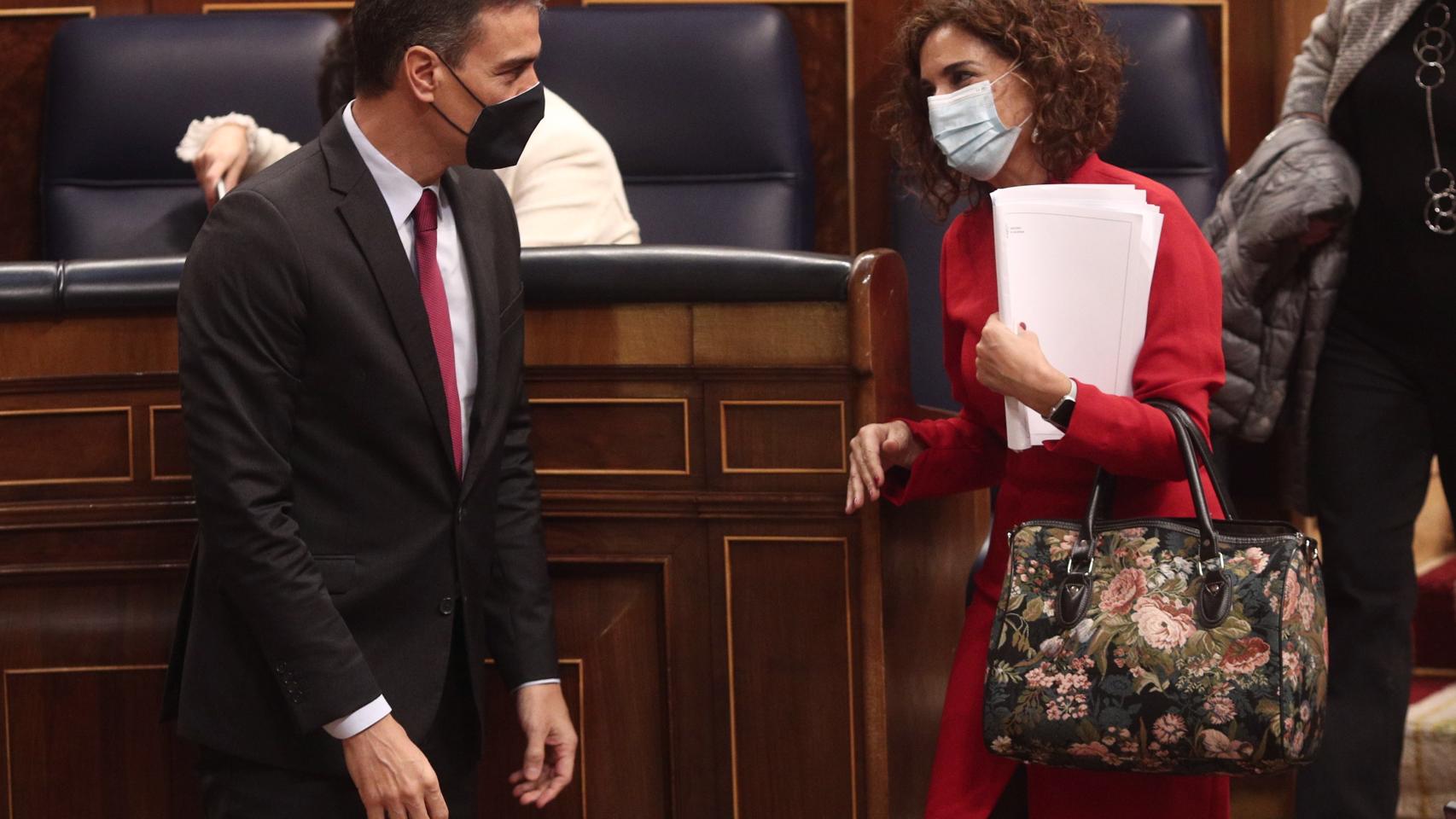 Pedro Sánchez y María Jesús Montero.