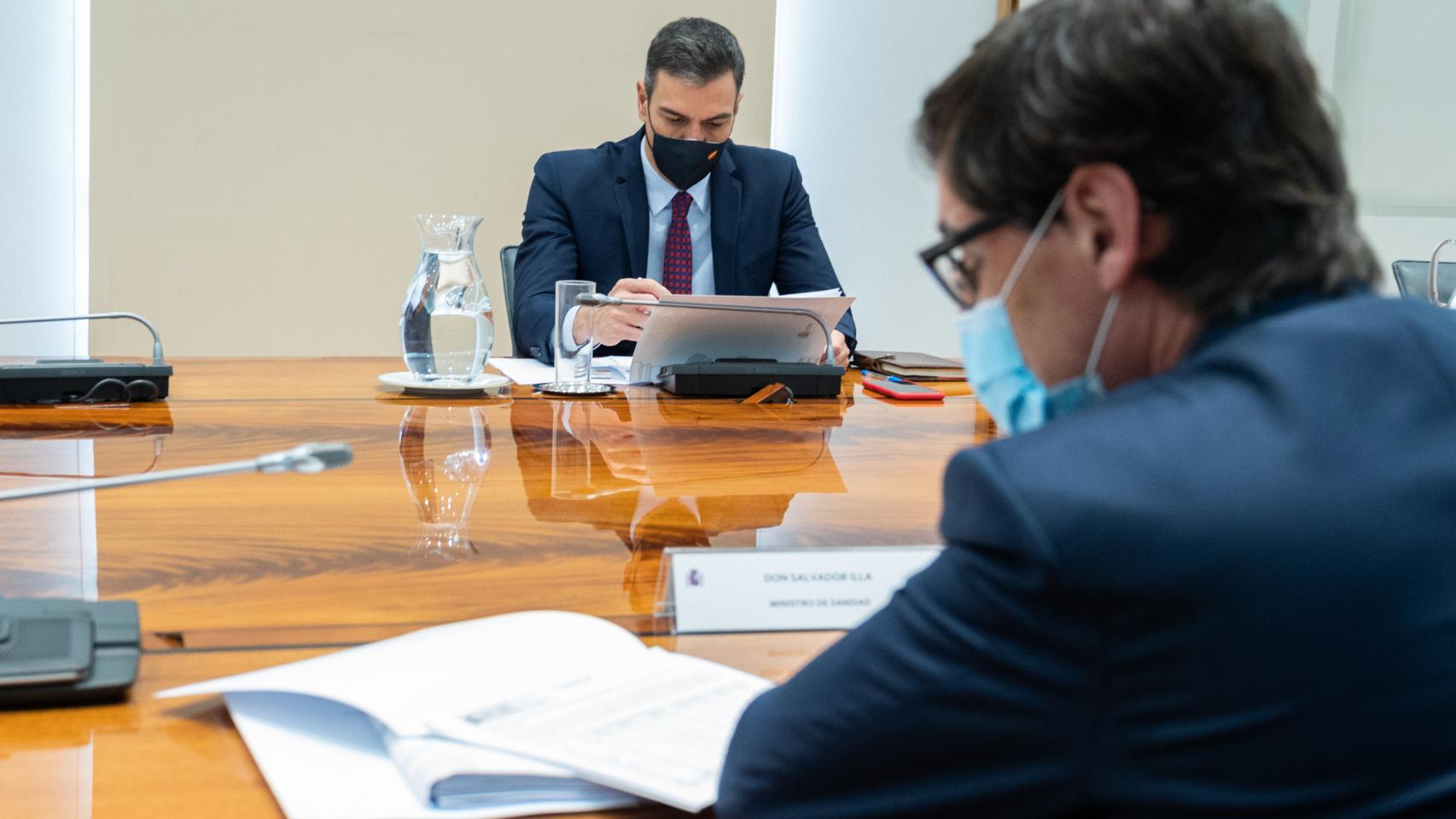 Pedro Sánchez y Salvador Illa.
