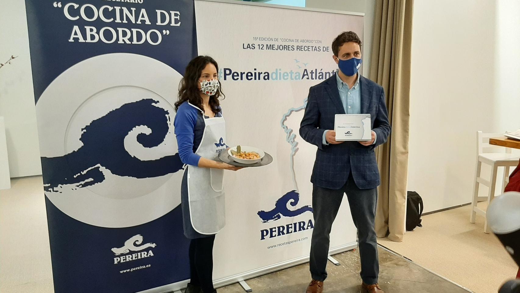 Ruy Andrade, director de comunicación de Pereira, y Amil López durante la presentación.