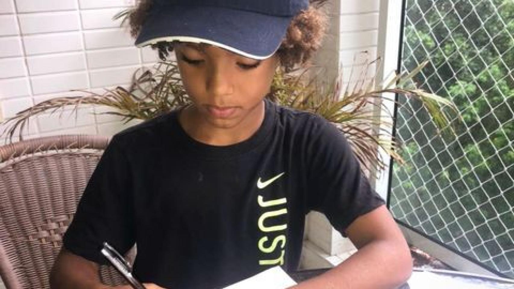 Kauan Basile, firmando su contrato con Nike