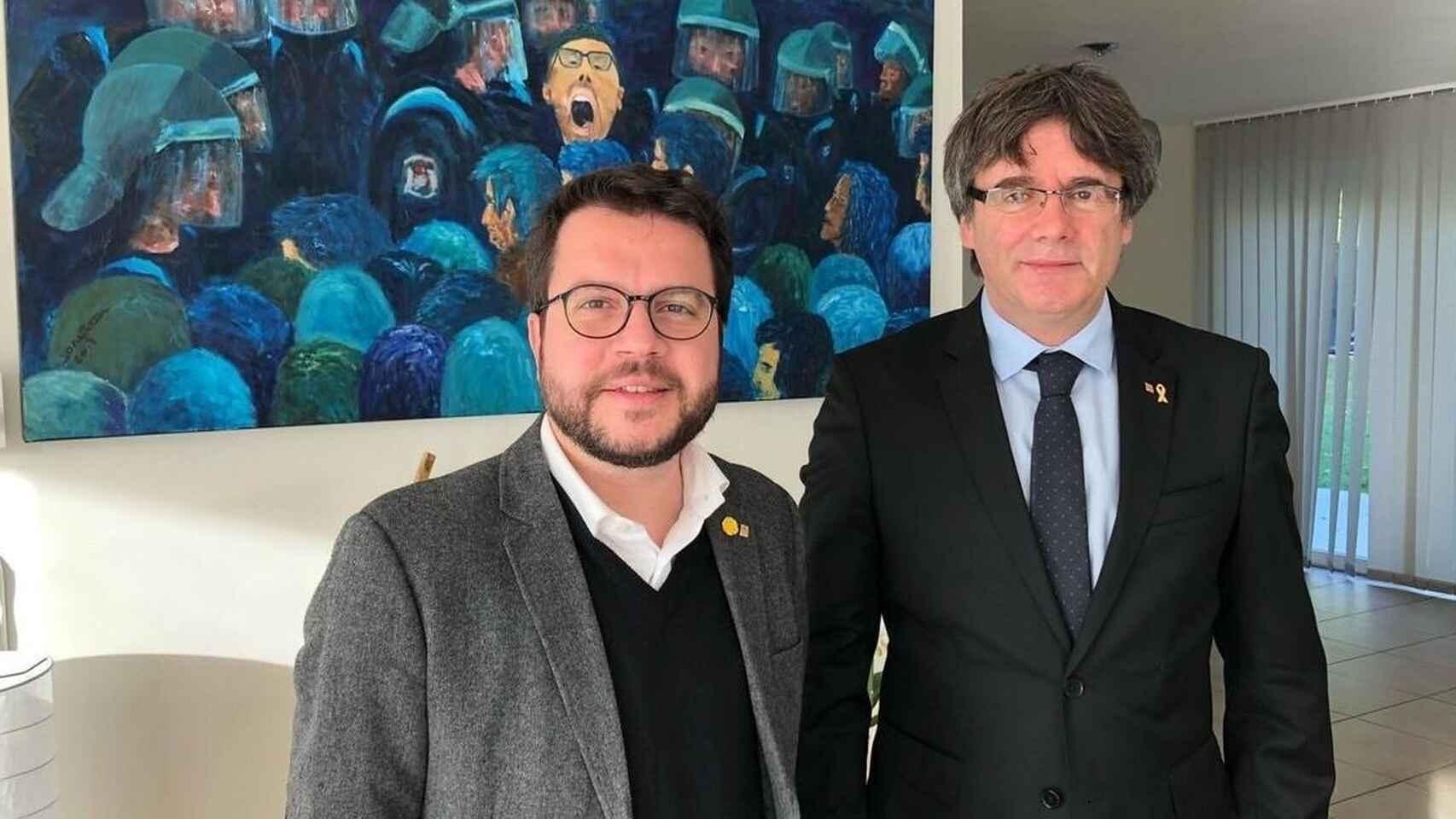 El presidente de la Generalitat, Pere Aragonés, y el ex presidente Carles Puigdemont.