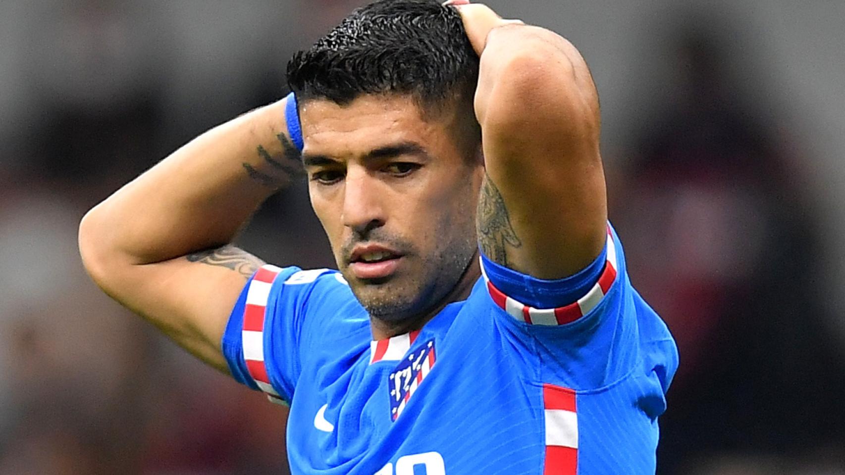 Luis Suárez, con las manos en la cabeza