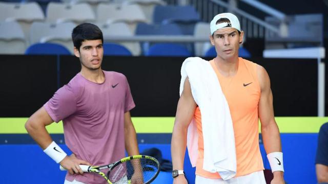 Carlos Alcaraz y Rafa Nadal tras un entrenamiento en el Abierto de Australia