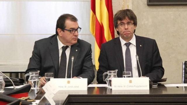 Jordi Jané, en un acto con Puigdemont cuando era consejero de Interior./
