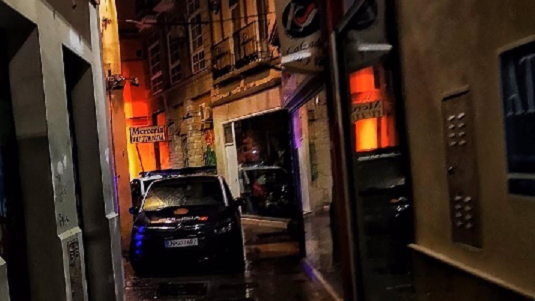 Un coche de Policía Nacional en el centro de Málaga.