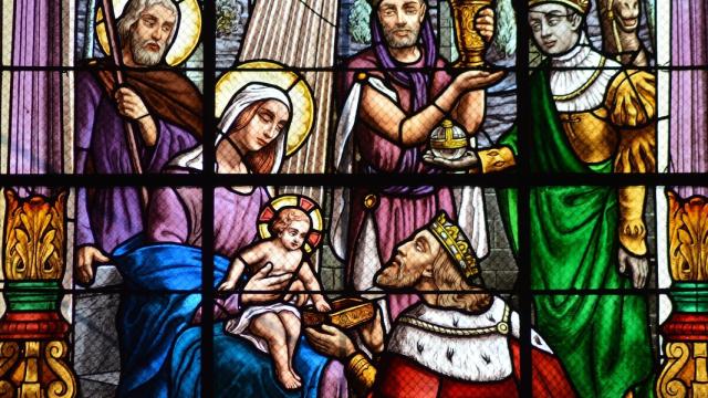 Los Reyes Magos frente a Jesús.