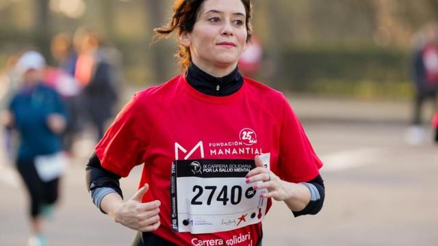 isabel Díaz Ayuso, durante una carrera en Madrid.