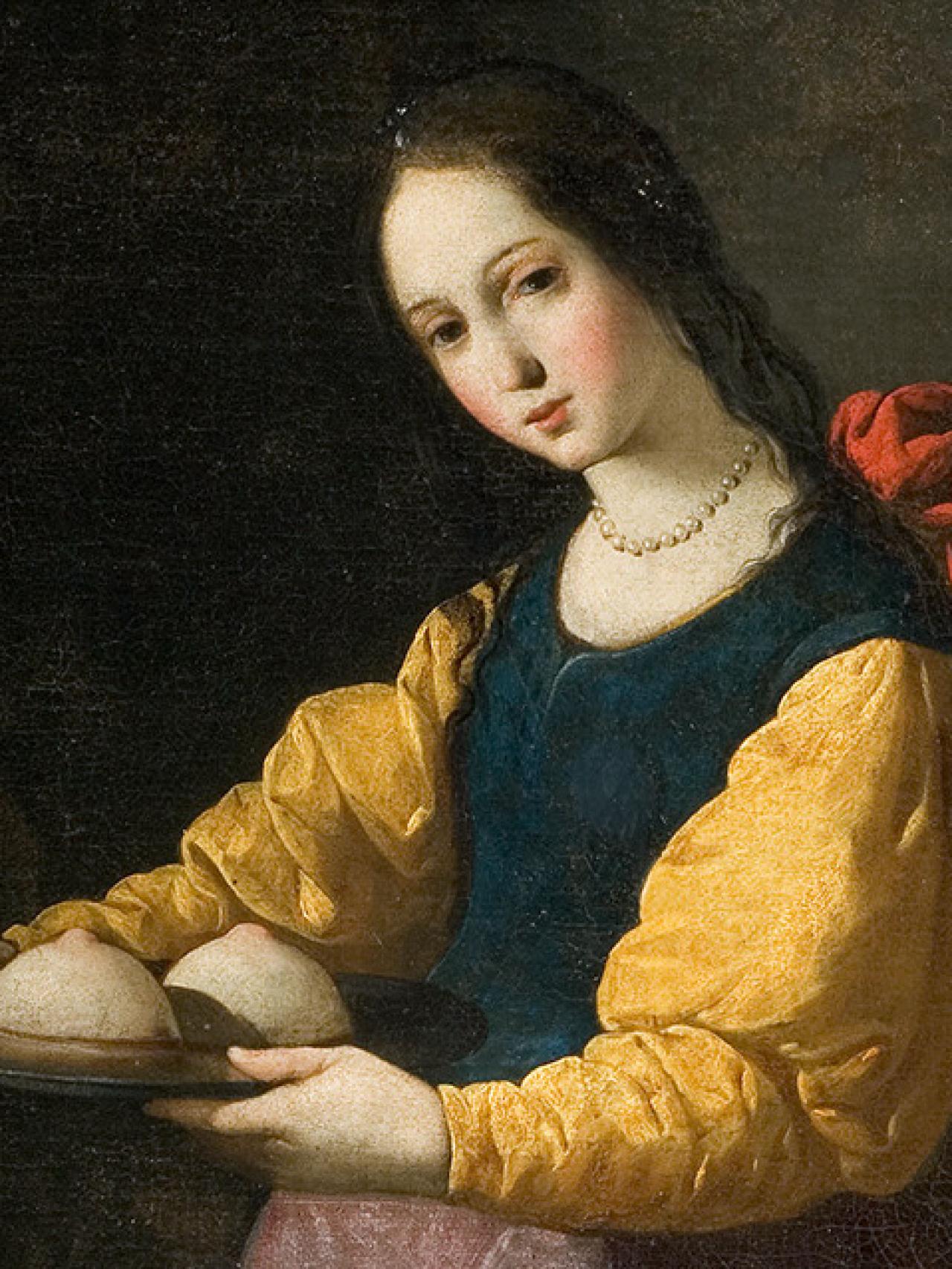 Imagen de Santa Águeda, de Francisco Zurbarán, donde muestra los típicos bollos en forma de pecho.