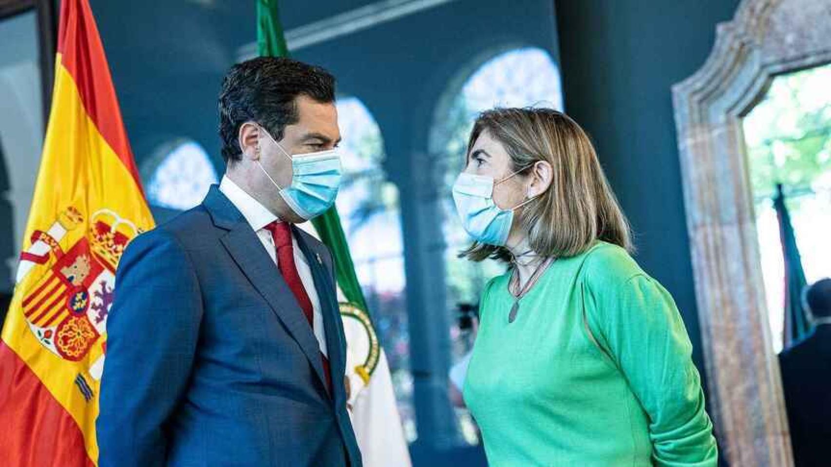 El presidente de la Junta, Juanma Moreno, y la consejera de Empleo, Rocío Blanco.