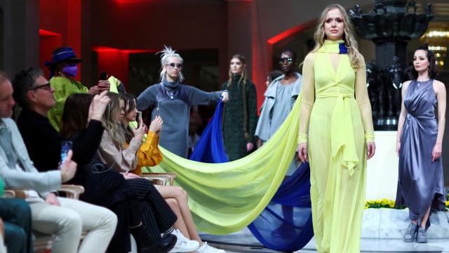 Ukraine refugee and dancer Nataliia Ovcharova presents creations by designer Anja Gockel for the show Weltgewandt in Hotel Adlon, during Fashion Week in Berlin, Germany, March 15, 2022.