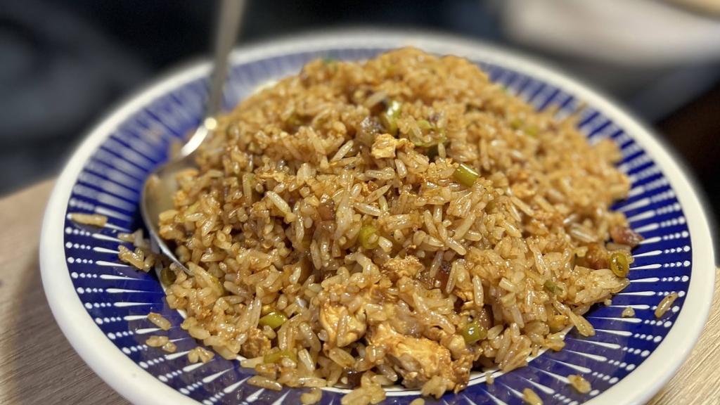 Arroz de verdura ácida y carne ahumada en Chila