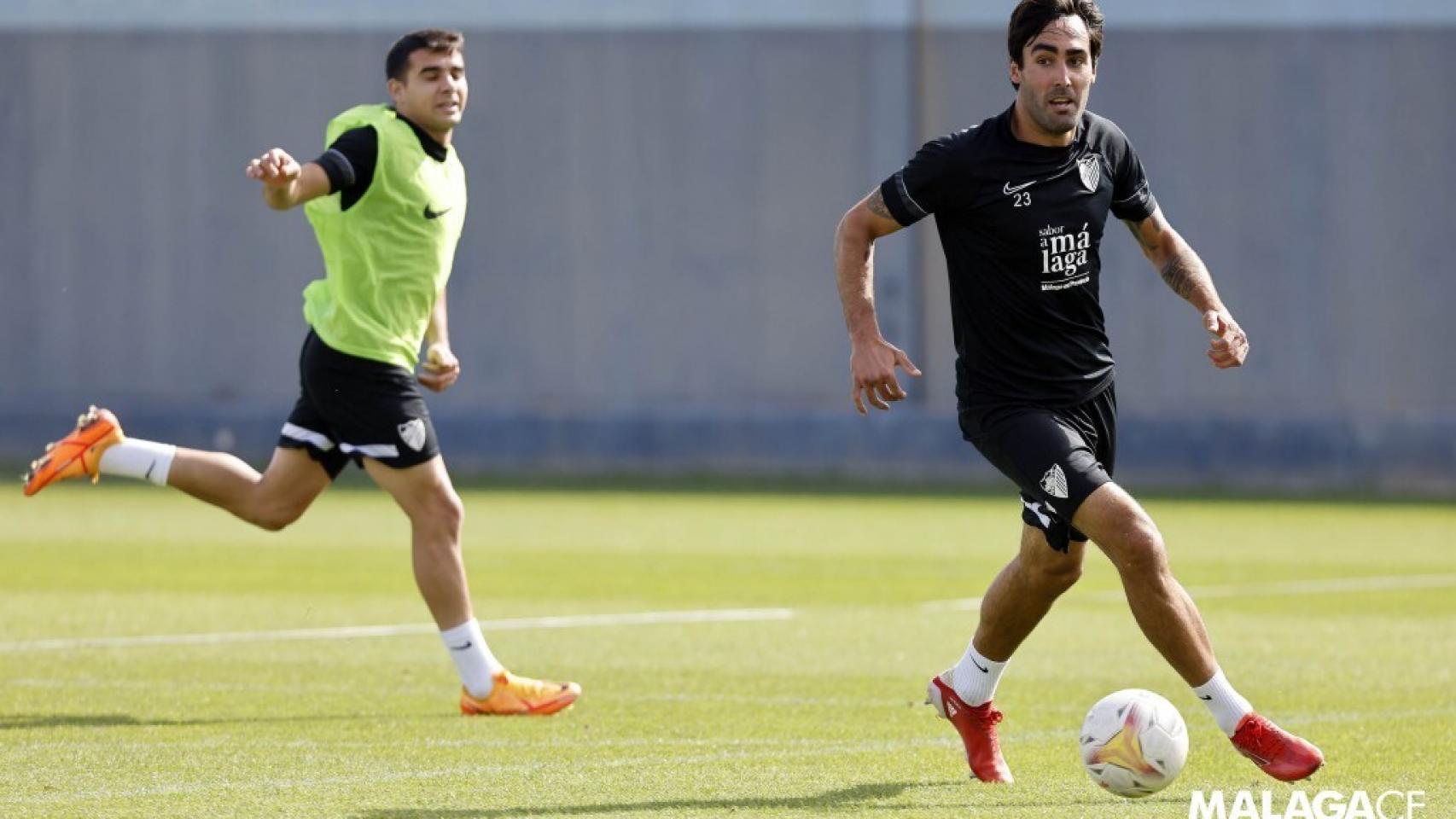 Escassi y Víctor Gómez en el entrenamiento.