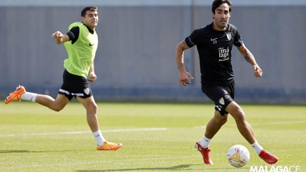 Escassi y Víctor Gómez en el entrenamiento.