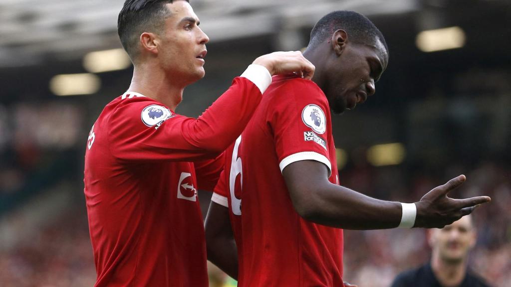 Cristiano Ronaldo consuela a Paul Pogba