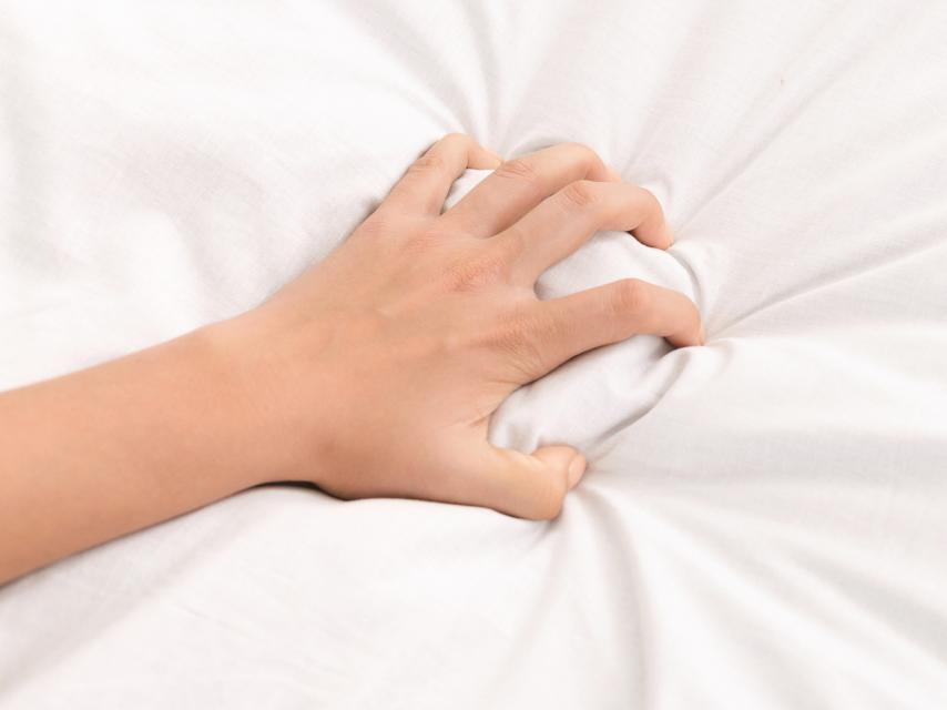 Mano mujer teniendo un orgasmo