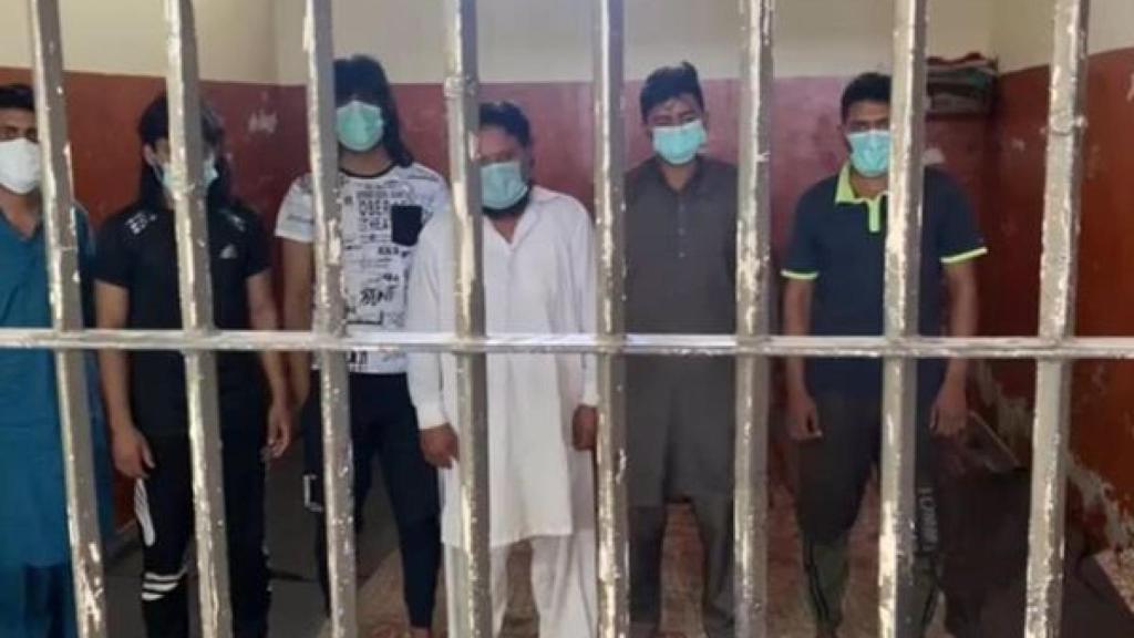 Los seis detenidos por el doble asesinato.