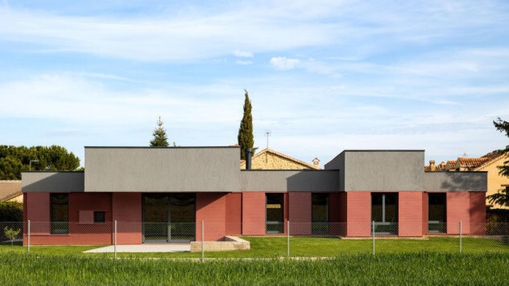 Imagen de la casa con estructura prefabricada de madera